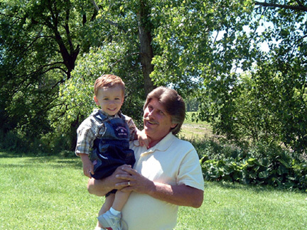 Austyn & Grampa (me) summer of 05