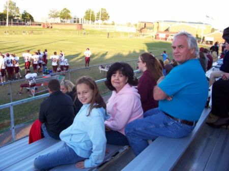 Jim, Brooklyn (grandaughter) & me at football game