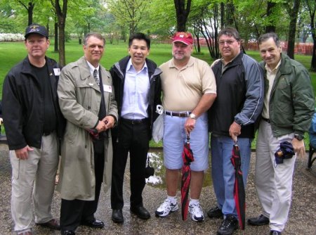 Doug (raincoat) at Vietnam Memorial in Washington D.C. 2005