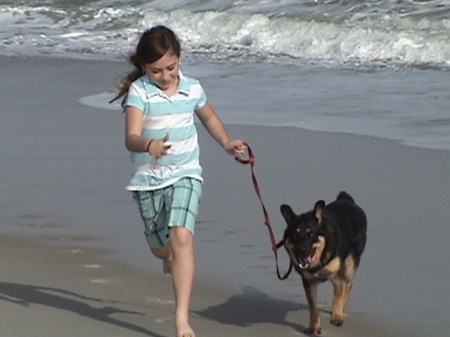 Jilly at the beach with Juno