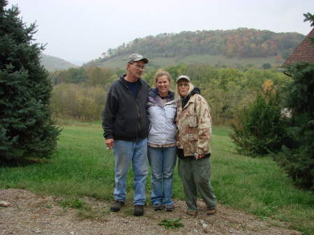 Mom, Dad, & I at the cabin on the Ohio River