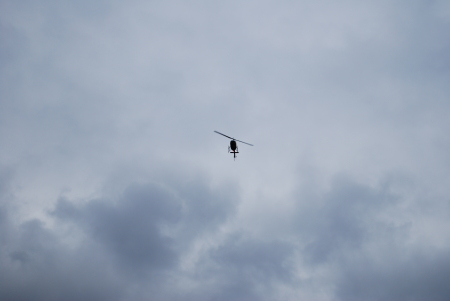 A helicopter checks things out
