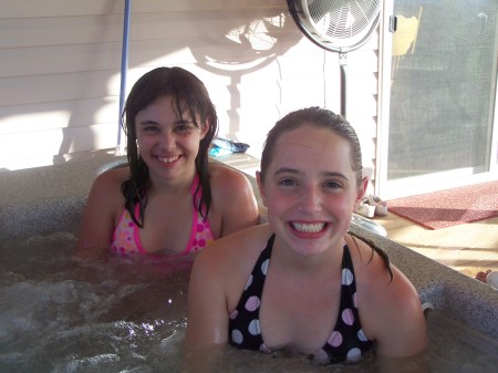 My 3rd kid, Kayla with her cousin relaxin in the hottub