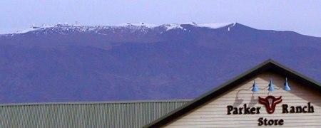 Shot of Mauna Kea(white mountain) above my town