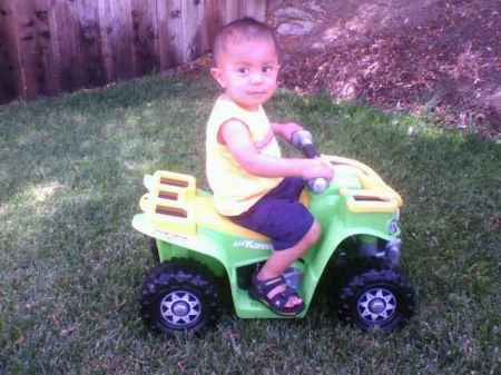 Lil' Vic on his Kawasaki Quad