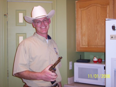 My husband's a wannabe cowboy.  Actually, he collects antique guns.