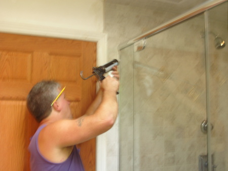 Me installing a shower door