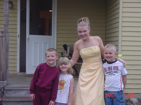 My oldest with the 3 little ones on Junior Prom Night