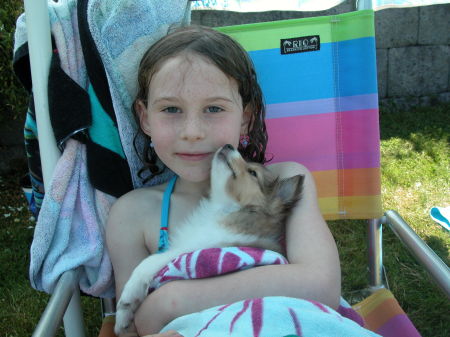 My niece Emma holding Maggie when she was a puppy