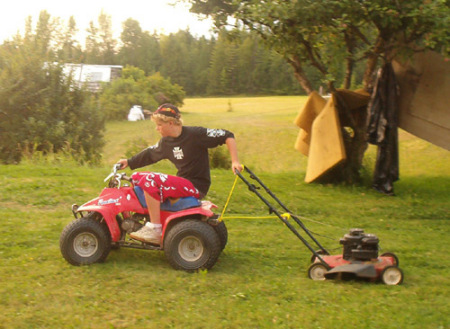 Kyle mowing the lawn