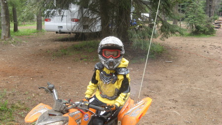 Logan on his quad