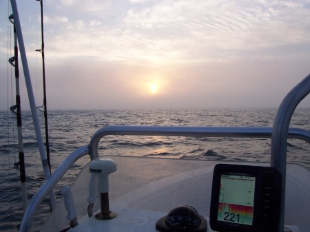 August 2007 out fishing with the rising sun