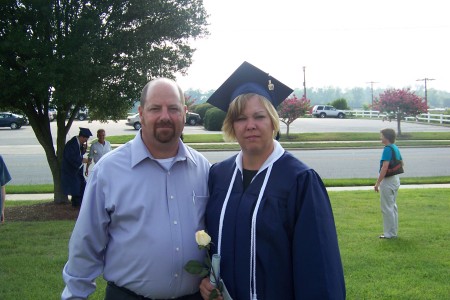 My husband & I at my college graduation July 2007