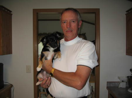 This is my dad holding Lola.