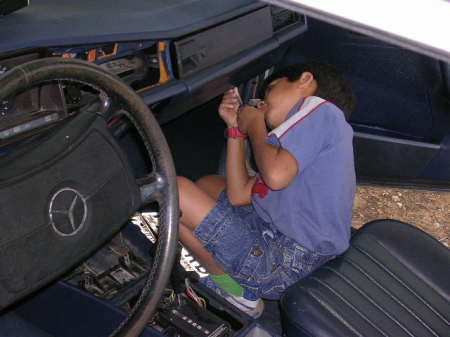 Teaching my son to strip a car for parts