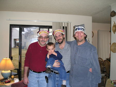 Pic of hubby (middle, holding our son) with his brothers.