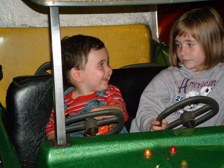 Big sister and Gabe on  his first ride