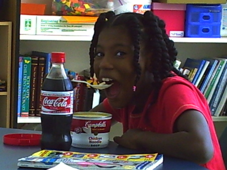 Looks like a Coke and Cambell soup add!  Starring Elise Russ