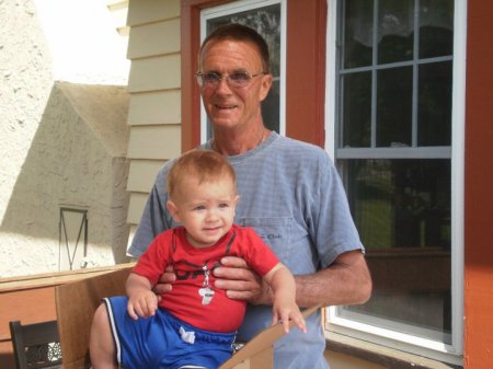 grandad in red granson in blue