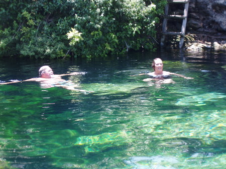 swimming in a cenote in Cancun