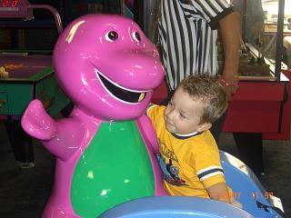 My grandson with Barney!