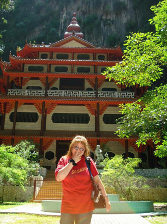 Me (w/peace sign) in Leong San Tong Temple in Penang, Malaysia