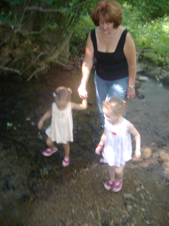Grandgirls and 'MiMi' wading in a creek