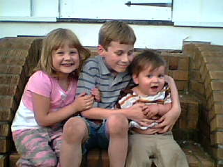 my kids Chelsea and Chad and grandson Joey on right
