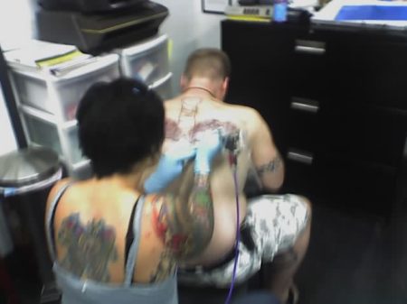 Me getting my back tattoo.
