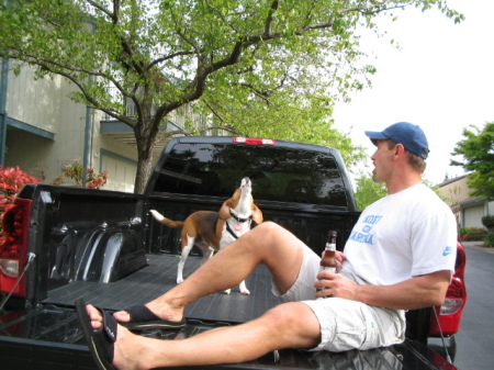 Odie Mae the howling beagle in her cattle herding truck