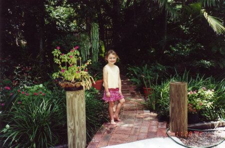 My Grand daughter Genevieve in my back Garden