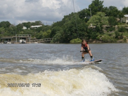Anika up on the wakeboard