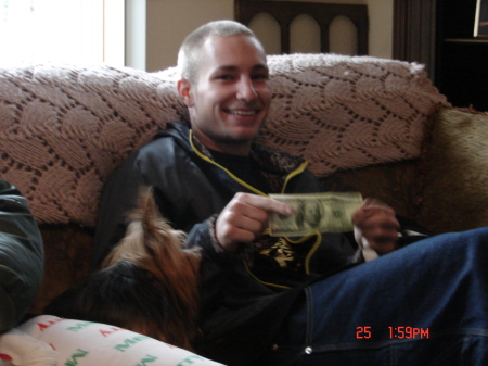 My son, Joey, receiving $100.00 for xmas 2006