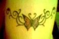 My pink tribal butterfly tattoo