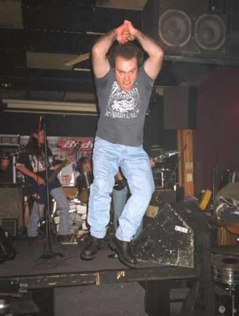 Jumping off the stage while performing at the Black Thorn