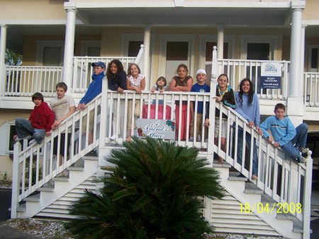 ALL OF THE KIDS ON THE STEPS OF OUR HOUSE