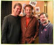 Dave  (L) with Kenny Loggins (C) and Magic 98.9 mid-day guy Brian Ross (R)