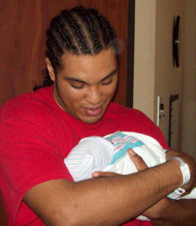 Proud Papa Aaron and Baby Isaiah