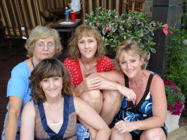 My mom (Betty Robertson), sisters, Vicki and Sonia, me, far right.