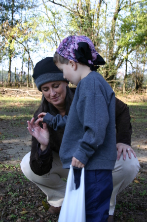 Inspecting the perfect pecan w/ my son