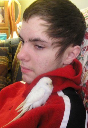 My Son, Matthew and one of our Parakeets!:)