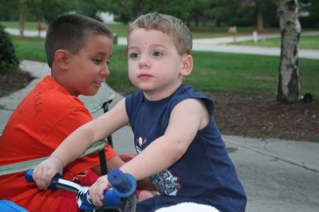 Brody riding his bike on 4th of July