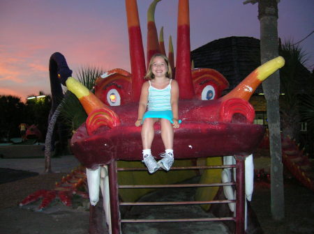 My daughter, Chloe, at Goofy Golf.  The tradition lives on!