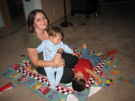 My three children: Jaqueline holding Adrian, and Dorian on the floor
