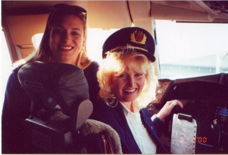 Carol sitting in Cockpit of Qantas 747 in 2000