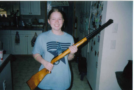 my daughter Missy with her shotgun