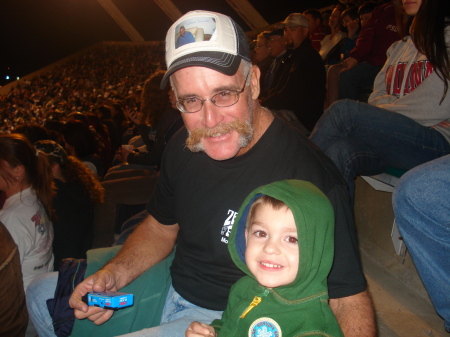 Colby with my stepdad at monster trucks