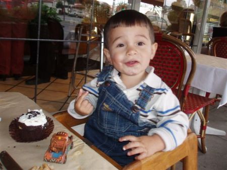 My Grandson Ethan Discussing the Fine Art of Chocolate Cupcakes