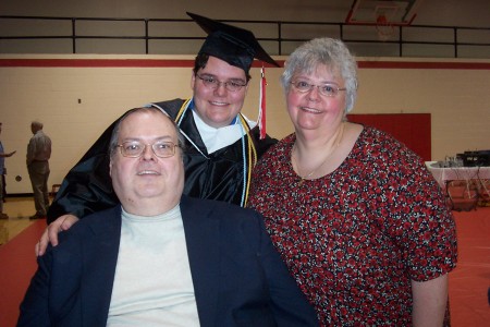 Me, Kay, and our son, James Edward III, at his Olivet College graduation