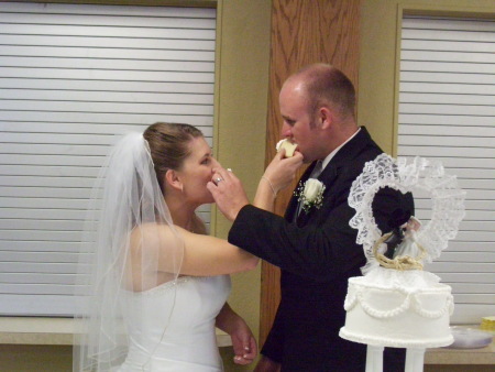 Les and Amanda and wedding cake